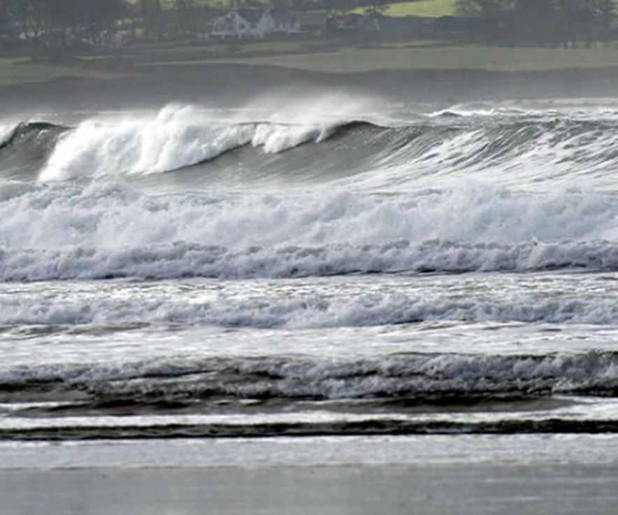 Waves breaking on the shore